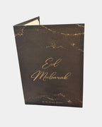 Carte de vœux Eid Mubarak, calligraphie dorée sur fond noir étoilé, signée By My Qamis Homme