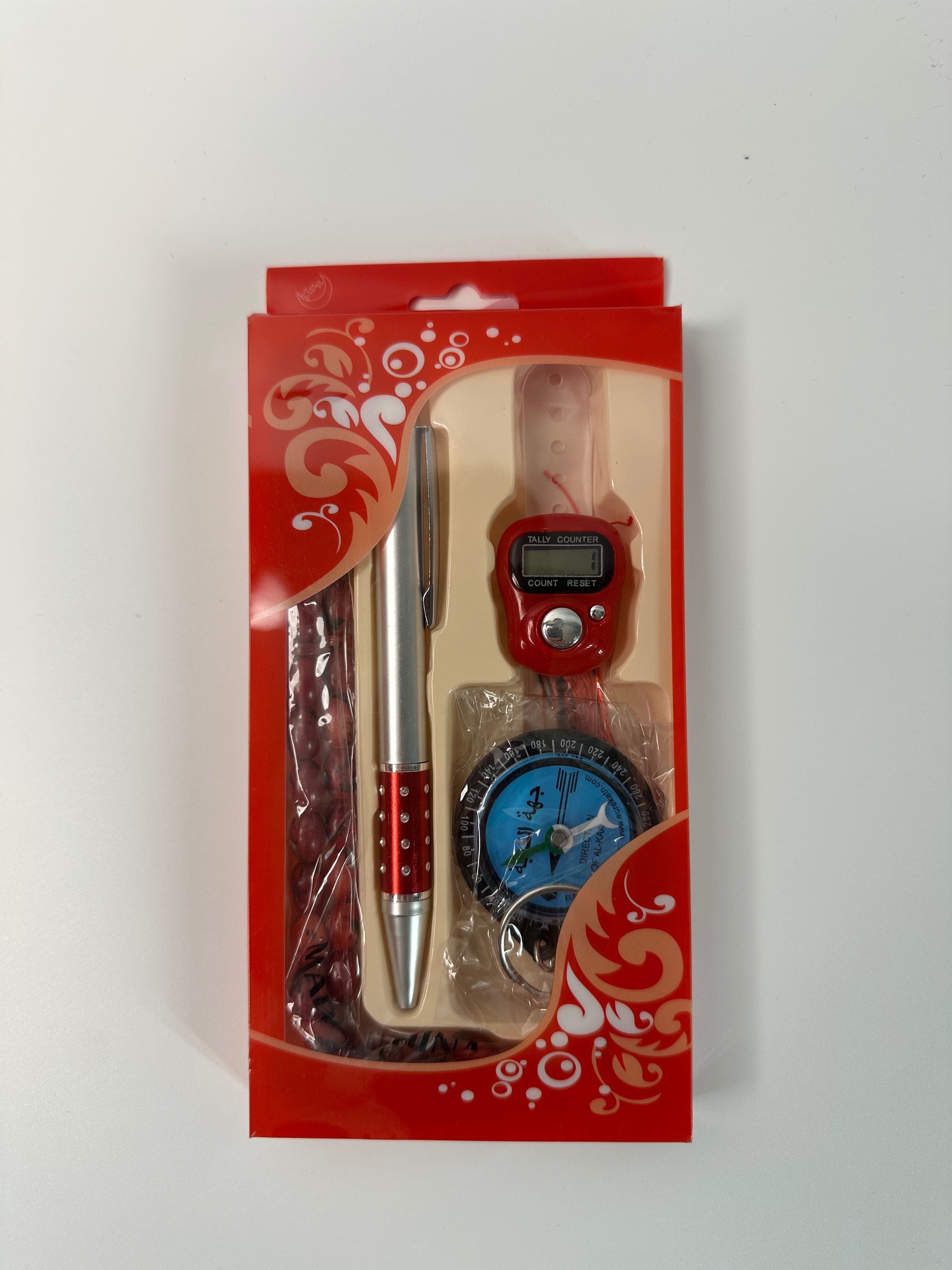 Coffret cadeau contenant un tasbih de 33 perles, un tasbih digital, une boussole et un stylo rouge