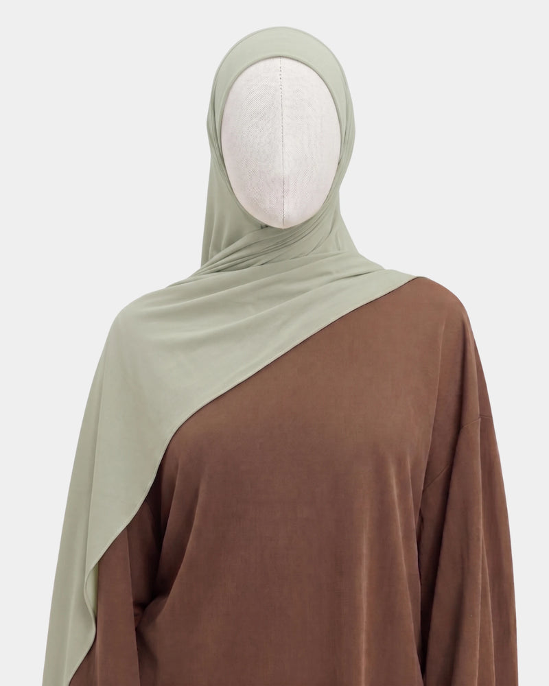 Hijab mousseline aimants intégrés vert amande Rawdaya, bonnet tube cousu, fini sans épingle, tissu léger et respirant