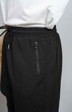 short de sport avec cache awra intégré avec poche zipé