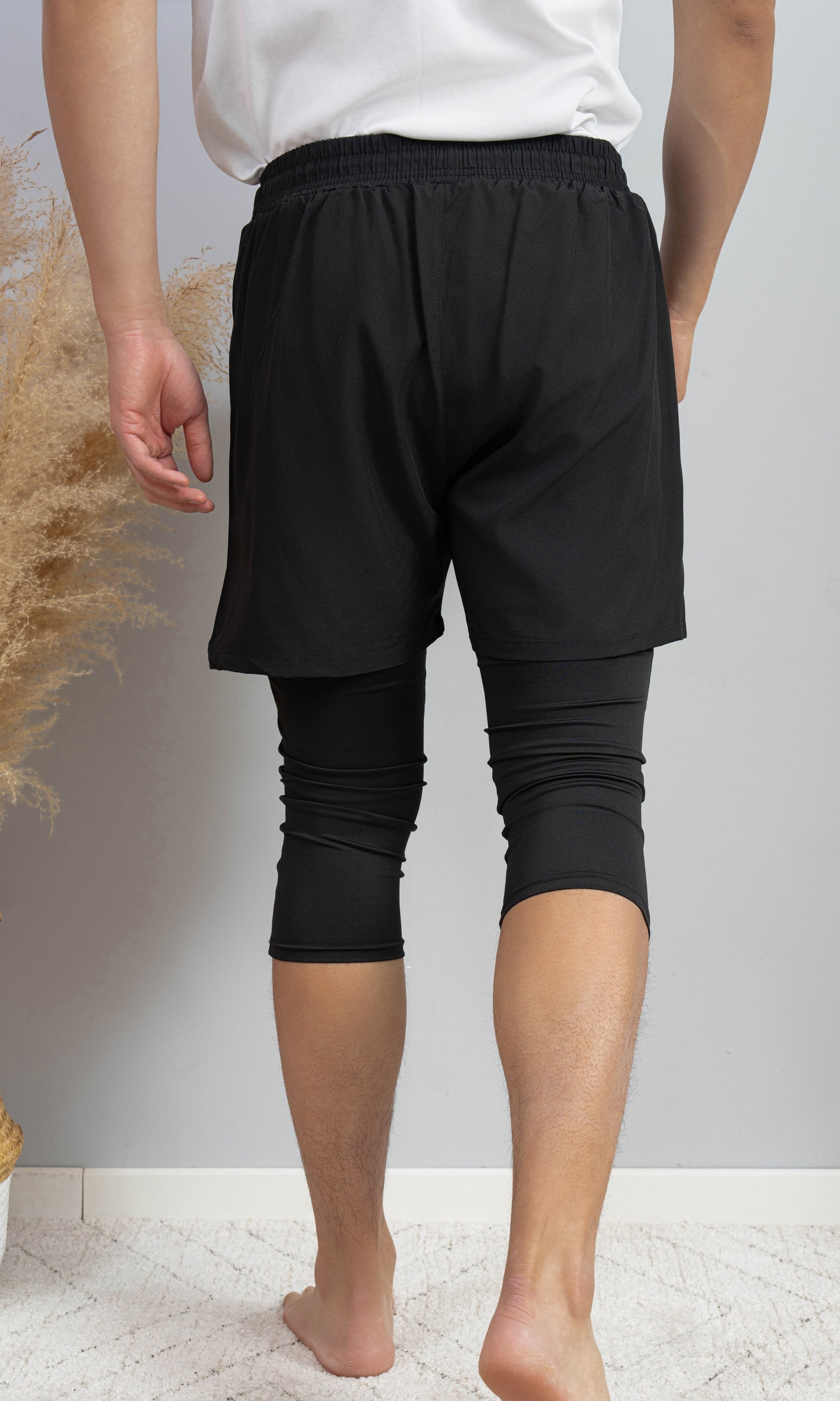 short de sport avec cache awra intégré de dos