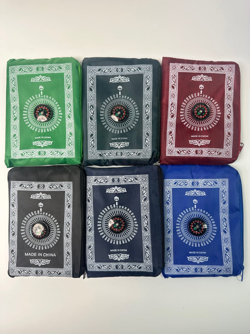 Pocket prayer mat with compass