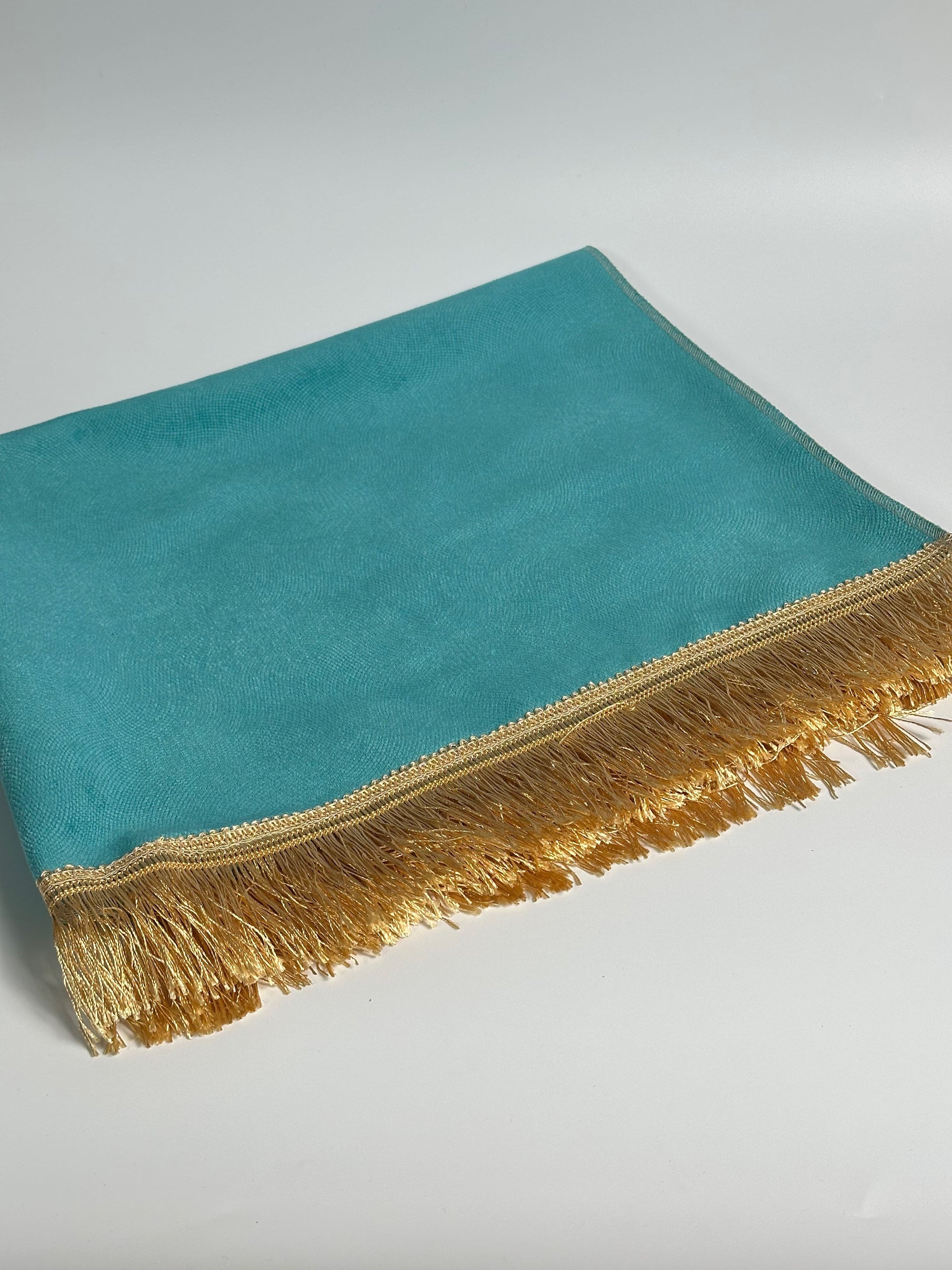 Tapis de prière turquoise avec froufrou doré